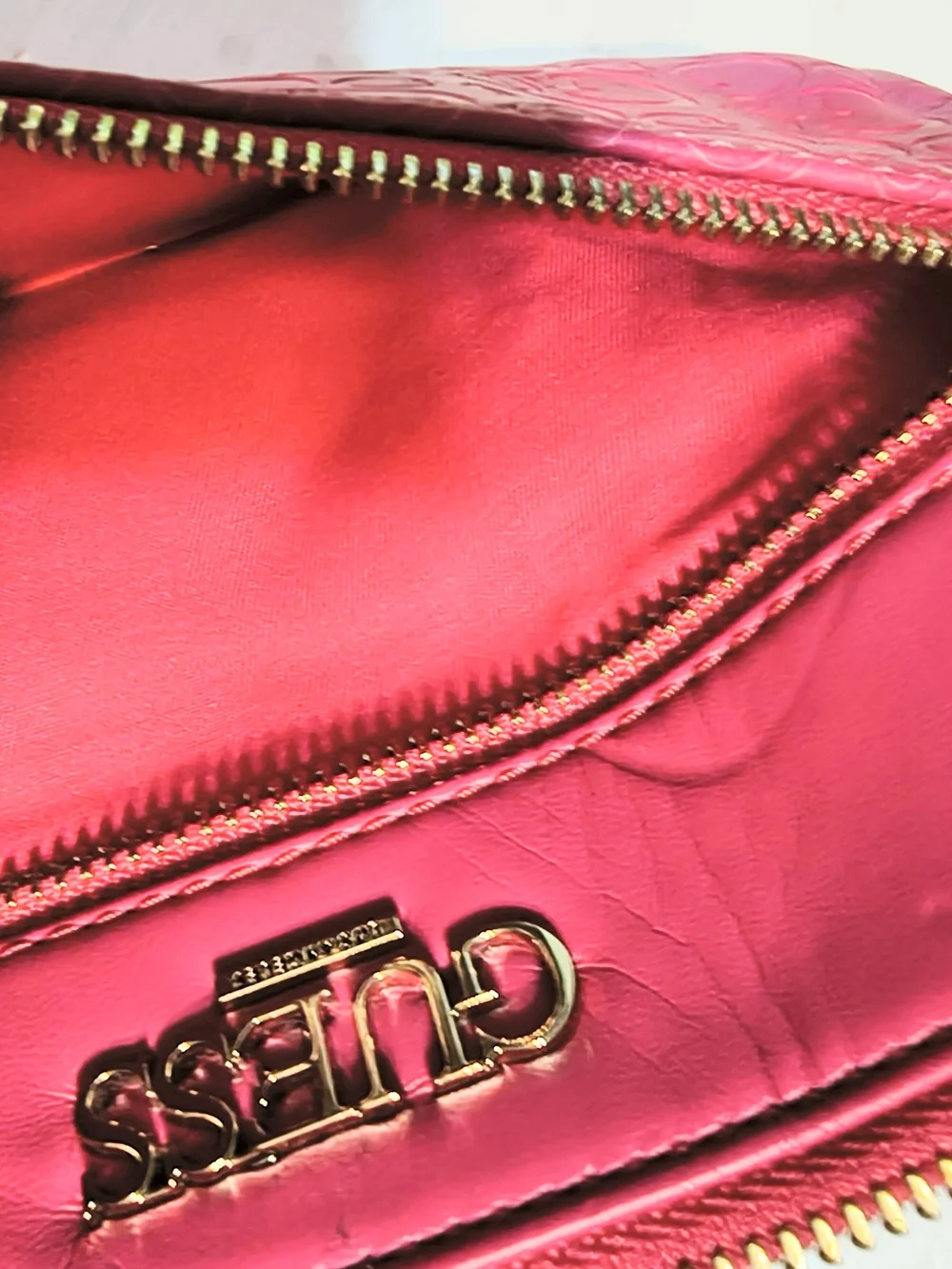 GUESS Hot Pink Embossed Logo Wristlet with Gold Hardware